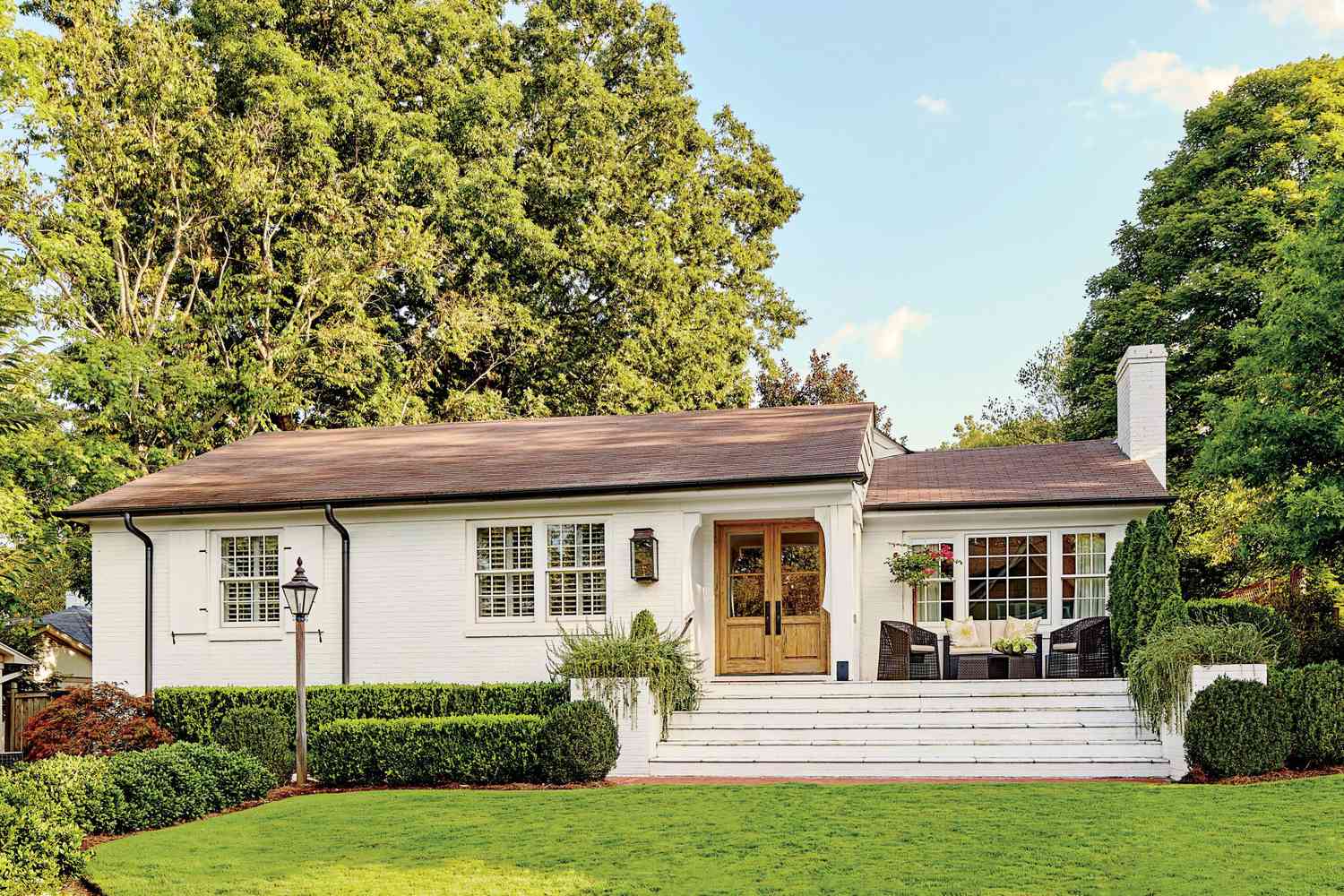 White Home with Wooden French Doors