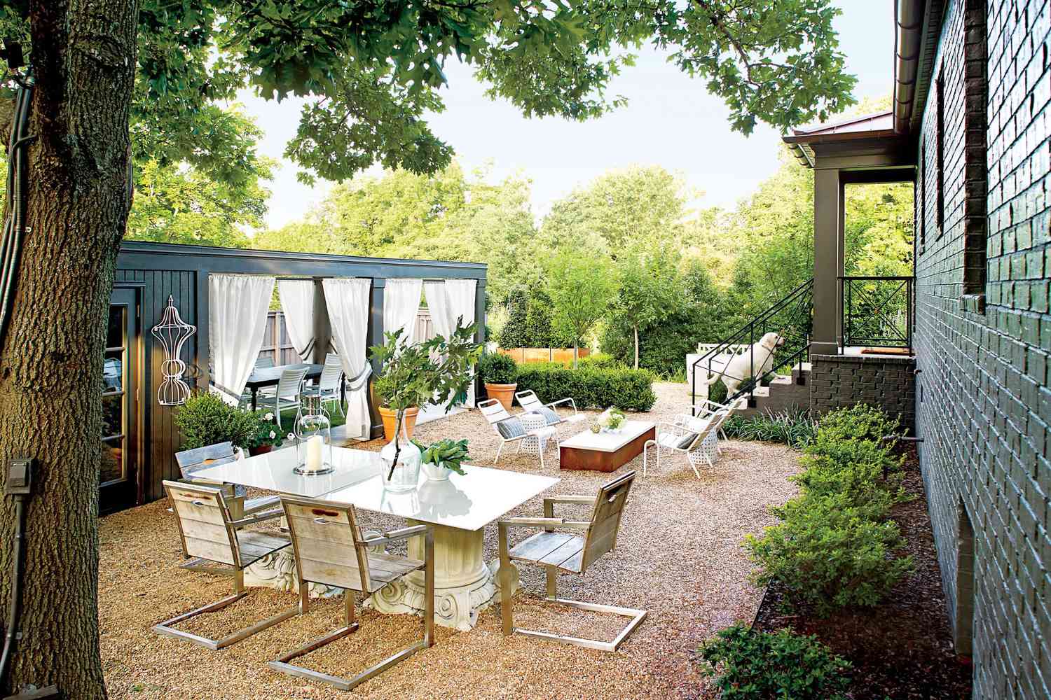 Gravel Courtyard with Seating and Dining Space