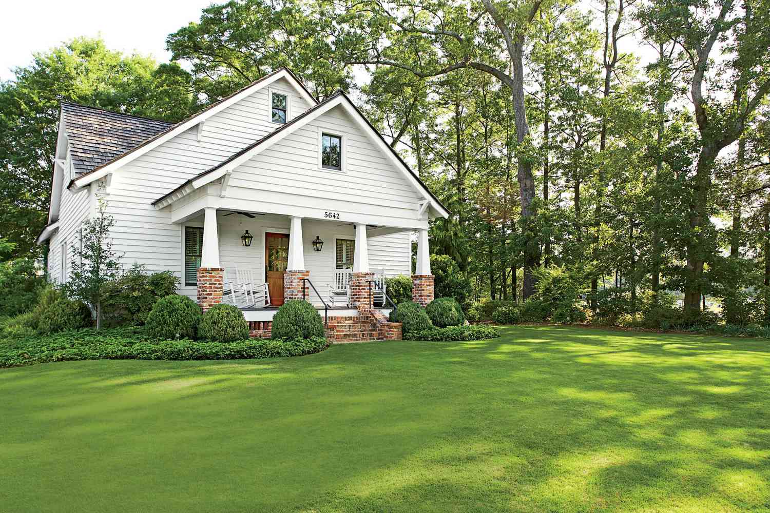 White Bungalow with Brick Pillars